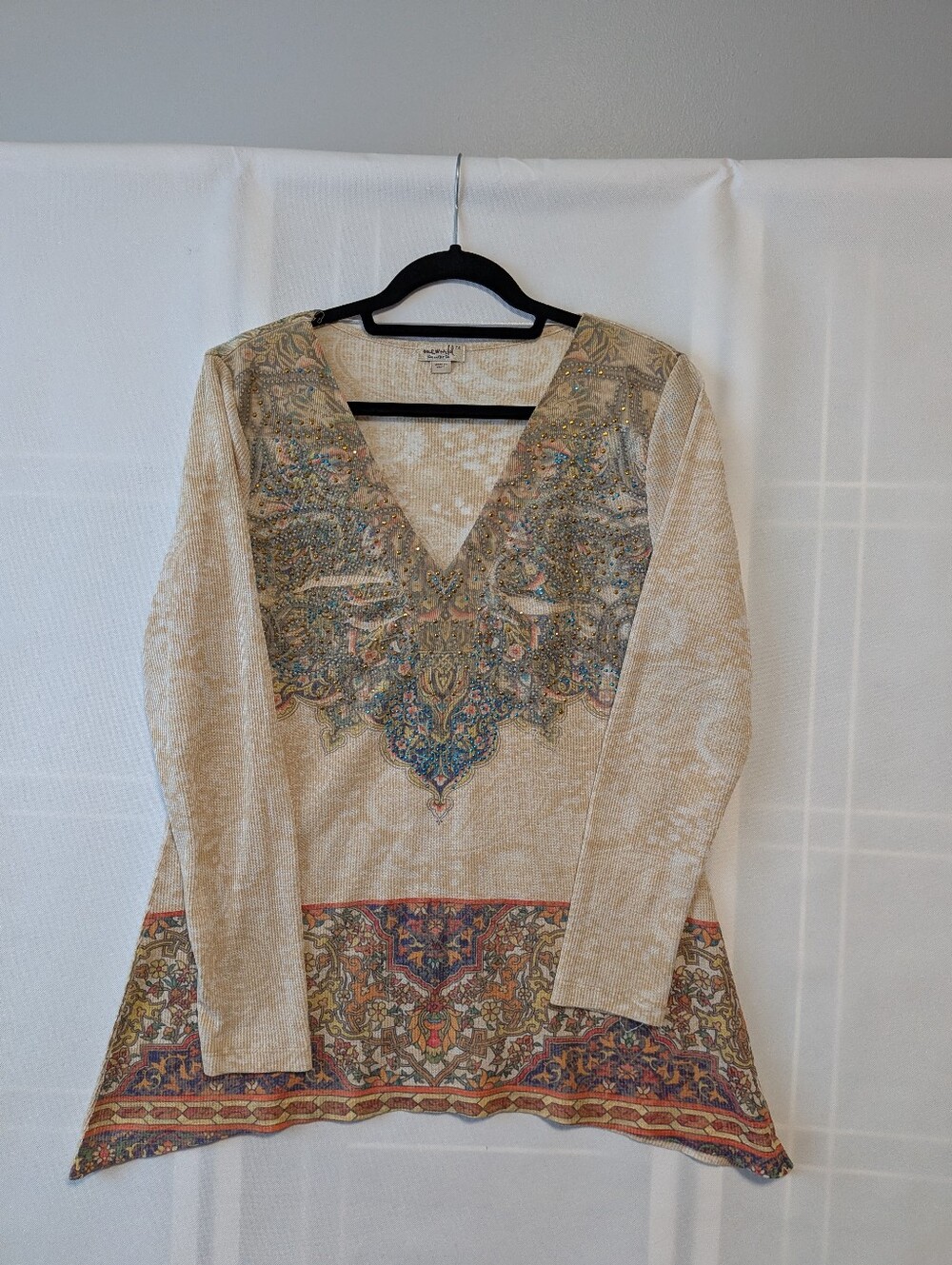 One World "Live and Let Live" bohemian-style tops, known for their intricate